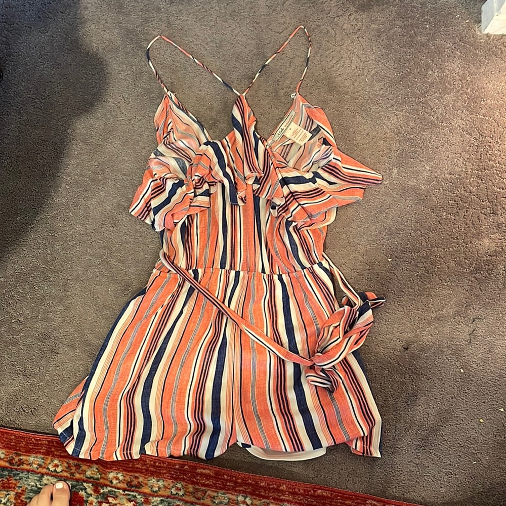 Romper tied middle open back